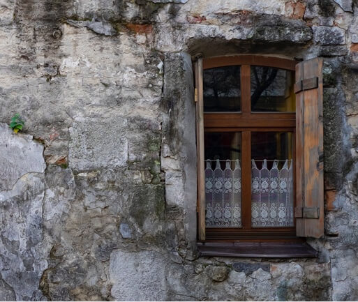 window on a old building's wall